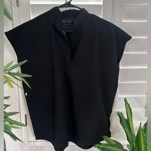 Figs black scrub top XS but fits more like a S (if you buy the one pocket tops)